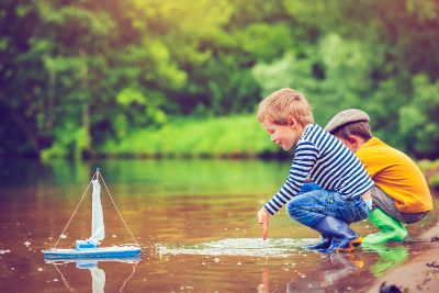 child playing in the river